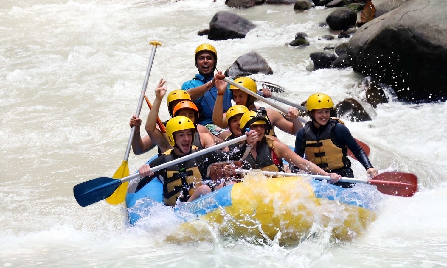 Tourist do white water rafting at Ayung River Ubud