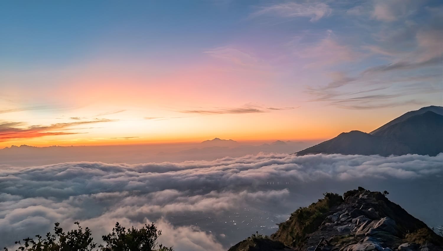 Beautiful sunrise view during Hiking Mt. Batur on the Bali Trekking and Rafting Tour combo