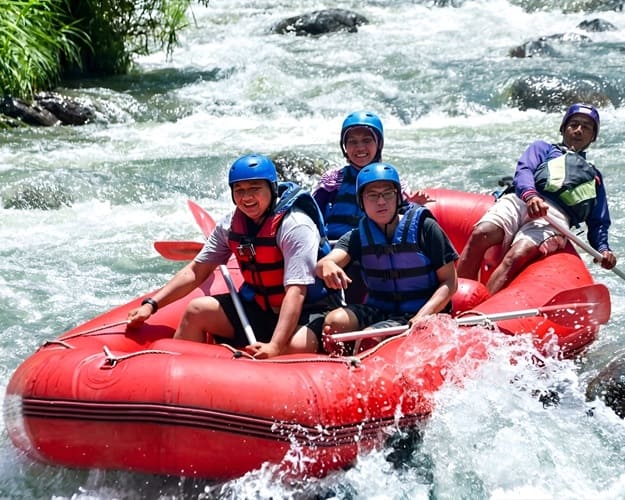 Paddle rafting down the scenic Ayung River rapids and a 60-minute beach horseback riding excursion followed by a 2-hour traditional Balinese massage package